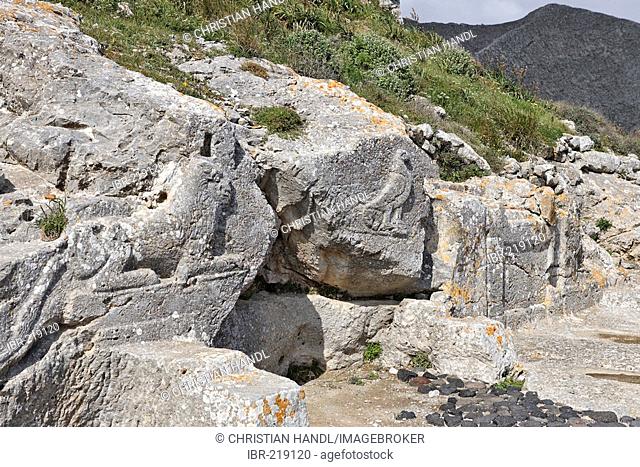 Sacred site of Artemidoros with stone relief of a lion (Apollon) and an eagle (Zeus), Thira, Santorini, Greece