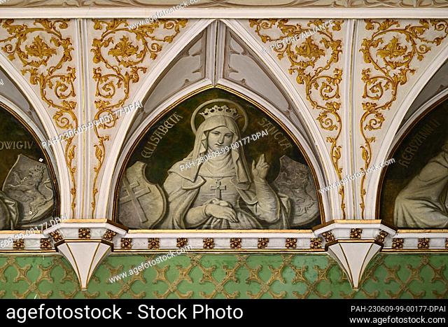 09 June 2023, Thuringia, Friedrichroda: An image of Saint Elisabeth can be seen in the ancestral gallery of Reinhardbrunn Castle