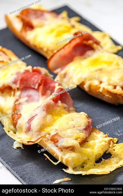 baguette baked with ham and cheese