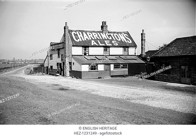 The World's End Inn, Fort Road, West Tilbury, Essex, c1945-c1965. The inn is an example of a typical Essex weatherboarded building
