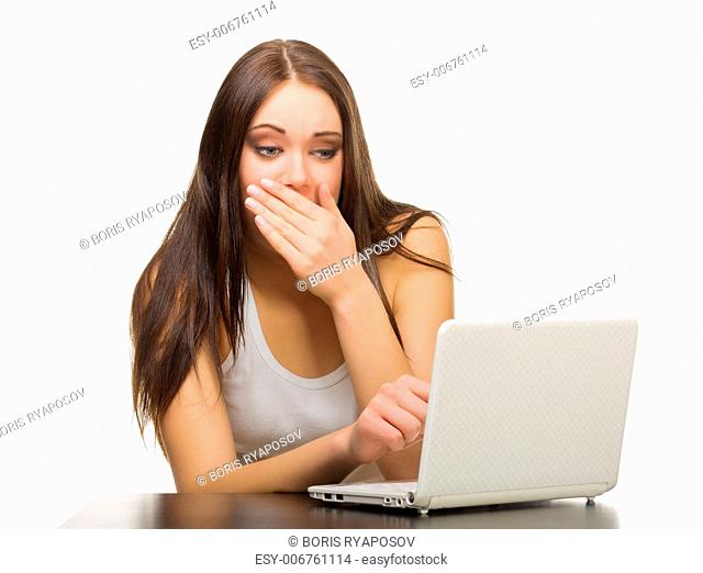 Young smiling girl with laptop isolated