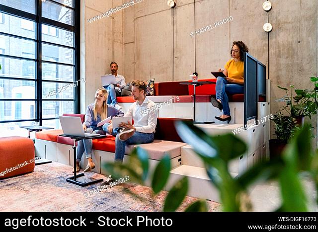Employees working at coworking office