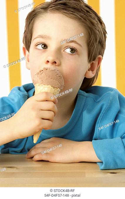 Boy eating ice