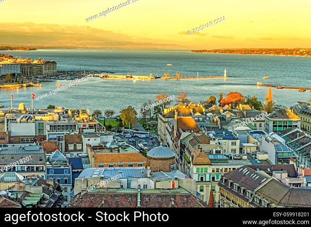 Panorama of Geneva city with Leman lake by beautiful sunset from cathedral Saint-Pierre, Switzerland