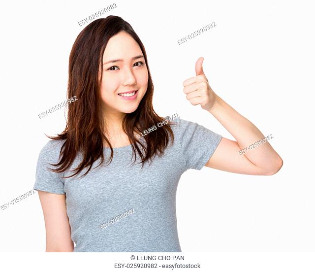 Young Woman with thumb up gesture