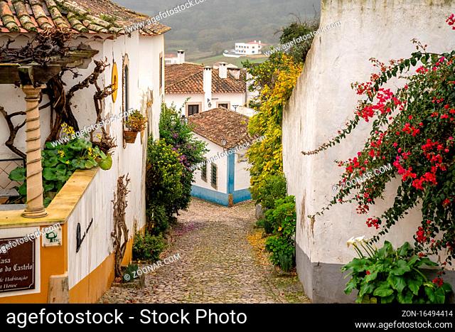 Obidos, Portugal - 13 December 2020: the picturesque houses and narrow streets in Obidos in Portugal