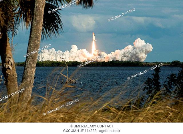 Space Shuttle Atlantis and its six-member STS-129 crew head toward Earth orbit and rendezvous with the International Space Station