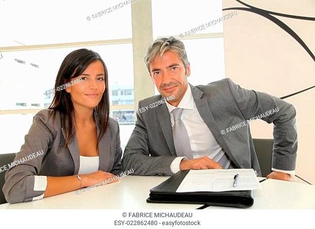Business partners signing contract