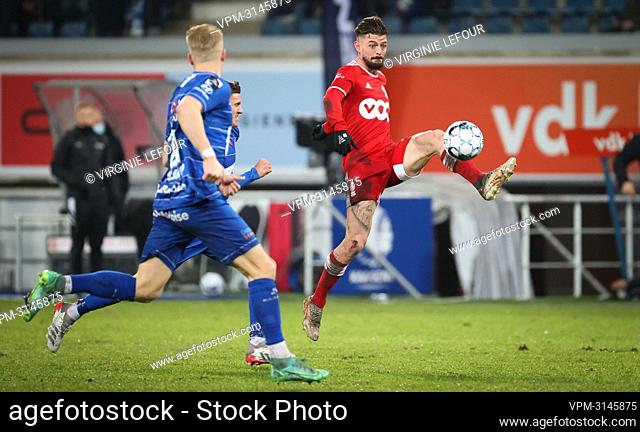 Gent's Andreas Hanche Olsen and Standard's Maxime Lestienne fight for the ball during a soccer match between KAA Gent and Standard de Liege