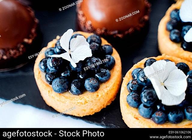 many delicious blueberry small tarts