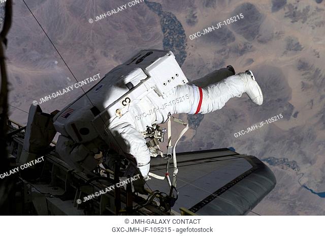 Astronaut Franklin R. Chang-Diaz, STS-111 mission specialist, participates in the second scheduled session of extravehicular activity (EVA) for the STS-111...