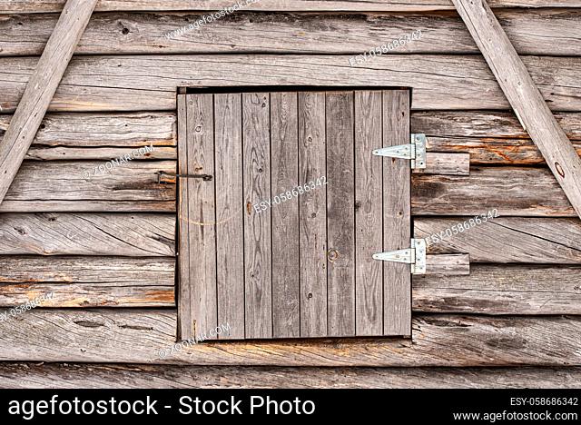 Old style vintage wooden door of country house