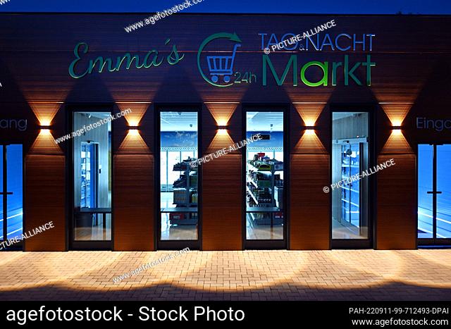 PRODUCTION - 08 September 2022, Thuringia, Ettersburg: ""Emma's Day & Night Market"" is written above the windows of a 24-hour village store