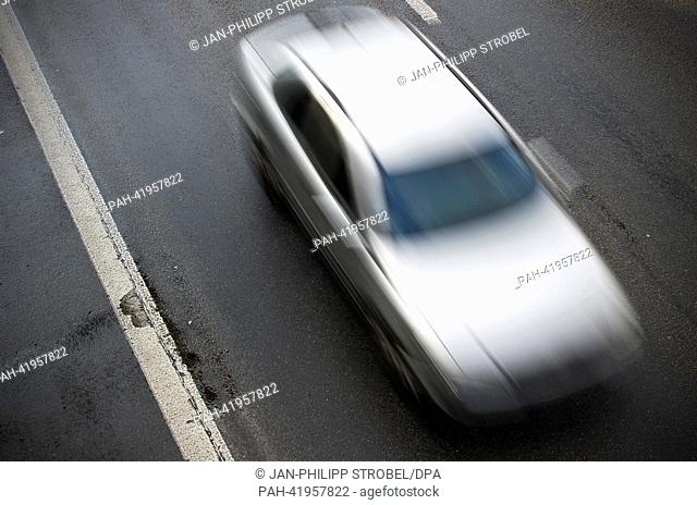 A car drives past a road hole on the shoulder on autobahn A52 near Meerbusch, Germany, 19 August 2013. The ADAC presented results about the condition of the...