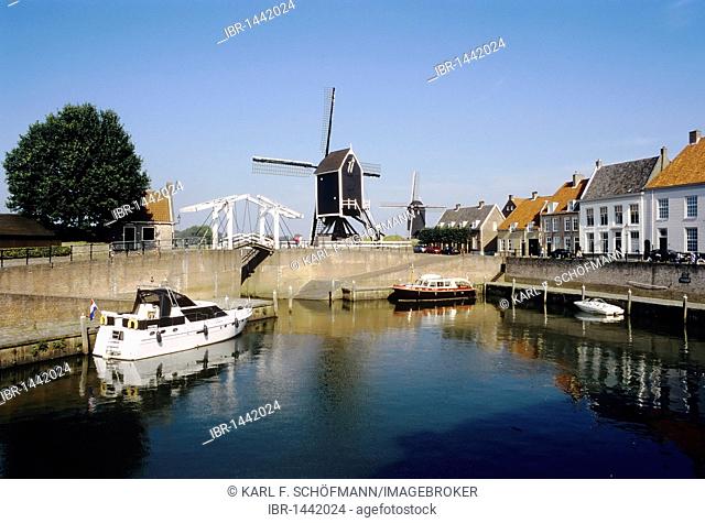 Romantic port with windmill, old fortified town of Heusden on the Maas river, North Brabant, Holland, Netherlands, Europe