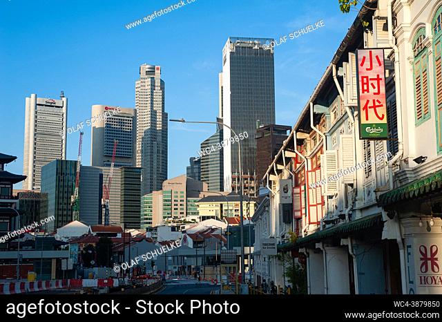 Singapore, Republic of Singapore, Asia - Cityscape with modern skyscrapers and office buildings in the central business district and historic shophouses in the...