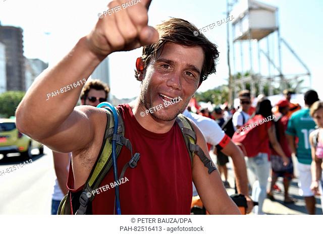 Julian Schmieder of the 'Trio for Rio' at Copacabana beach in Rio de Janeiro, Brazil, 5 August 2016. The three cyclists 'Trio for Rio' started their trip to Rio...