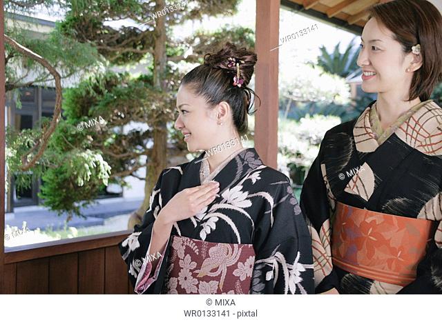 Two young women wearing kimono