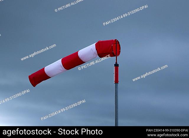 SYMBOL - 13 April 2023, Baden-Württemberg, Rottweil: A windsock blows in the wind during stormy weather. Photo: Silas Stein/dpa