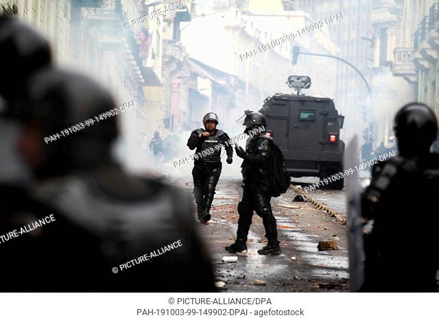 03 October 2019, Ecuador, Quito: Security forces are deployed in a protest against the increase in fuel prices and other economic measures planned by the...