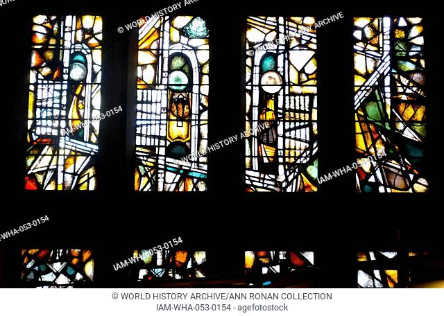stained glass windows designed by john Piper depict the light of god, at the New St Michael's Cathedral, Coventry