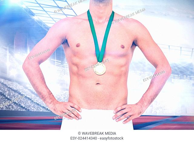 Composite image of athlete posing with gold medal on white background