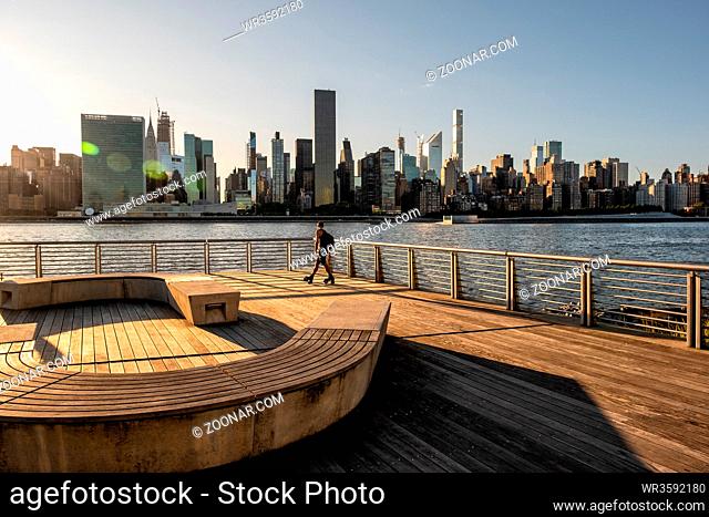 Queens NY - USA - Aug 29 2019: The buildings of midtown Manhattan view from Long Island City