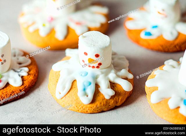 Melting snowman gingerbread for christmas celebration. Funny idea for kids cookies