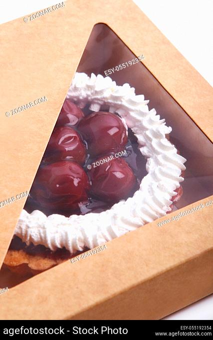 fresh and tasty sweet cherry cake in the box
