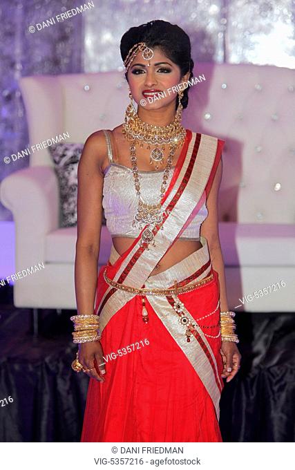 CANADA, SCARBOROUGH, 29.03.2014, NITHA NAVA, a South Indian actress, model and hostess of Vanakkam FM and Tamil One models an elegant outfit during a South...