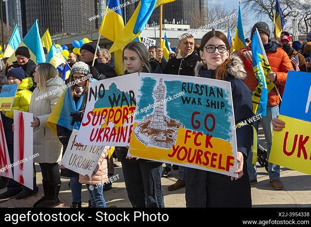 Detroit, Michigan USA - 27 February 2022 - Hundreds of people and a long convoy of trucks joined a rally supporting Ukrainians in their fight against the...