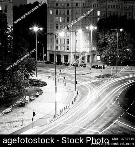 Light trails of the road traffic on Berlin's Strausberger Platz at night