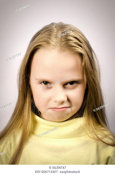 Grumpy little girl with an attitude