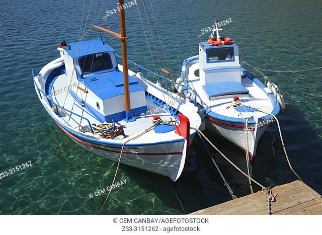 Traditional fishing boats at the small pier in Kamares village, Sifnos Island, Cyclades Islands, Greek Islands, Greece, Europe