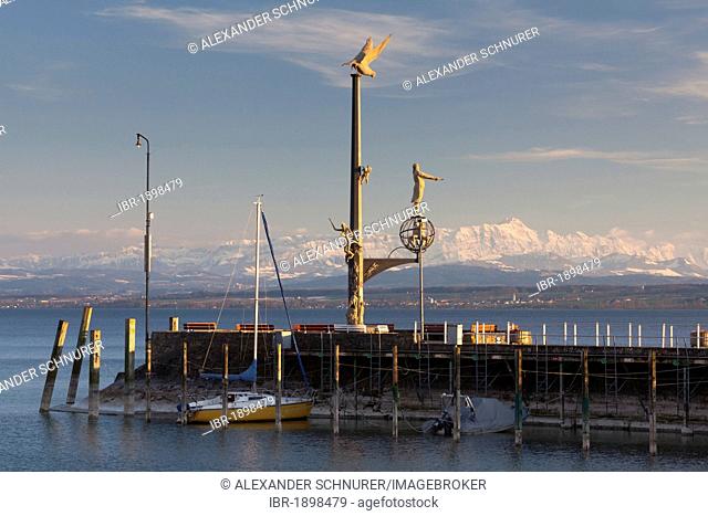 Magische Saeule, magic column, on the pier in Meersburg on Lake Constance with the Alpstein massif at back during foehn weather conditions, Baden-Wuerttemberg