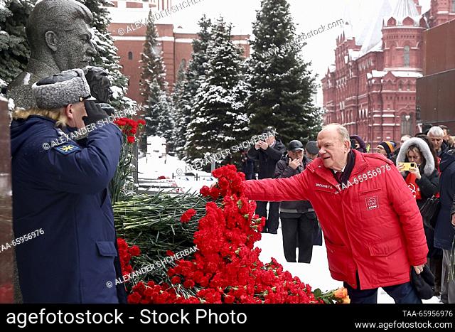 RUSSIA, MOSCOW - DECEMBER 21, 2023: Russian Communist Party Leader Gennady Zyuganov (R) takes part in a flower laying ceremony at Joseph Stalin's grave by the...