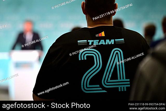 18 November 2023, Thuringia, Mühlhausen: ""Team 24"" is written on the T-shirt of a delegate at the state party conference of the CDU Thuringia in the Hotel...