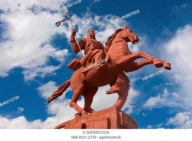 Kyrgyzstan, between Sary Chelek and Bishkek, Statue of horseman