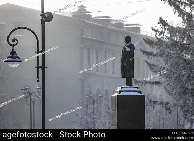RUSSIA, OMSK - DECEMBER 8, 2023: A statue of Russian revolutionary Vladimir Lenin in the Siberian city of Omsk on a frosty winter day