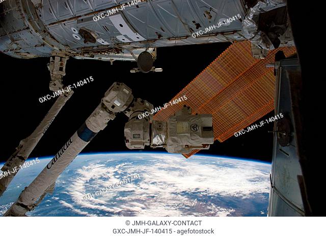 The Canadarm2 is pictured in this image photographed by an Expedition 40 crew member on the International Space Station. At the time the image was taken
