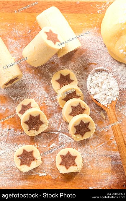Baking christmas cookies with chocolate star. Homemade bakery, xmas sweet, winter holidays concept