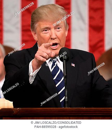 US President Donald J. Trump delivers his first address to a joint session of Congress from the floor of the House of Representatives in Washington, DC, USA