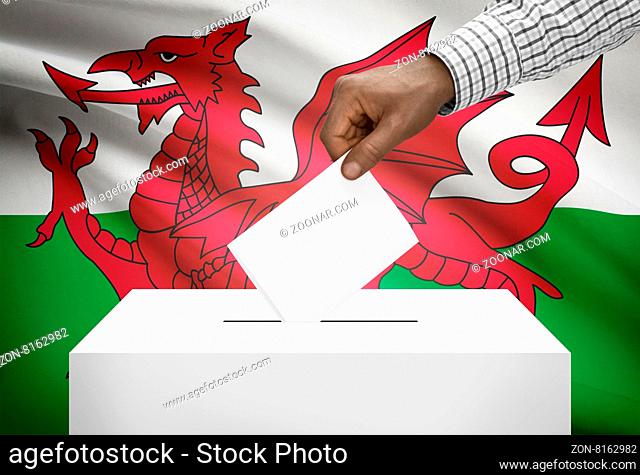 Ballot box with national flag on background - Wales