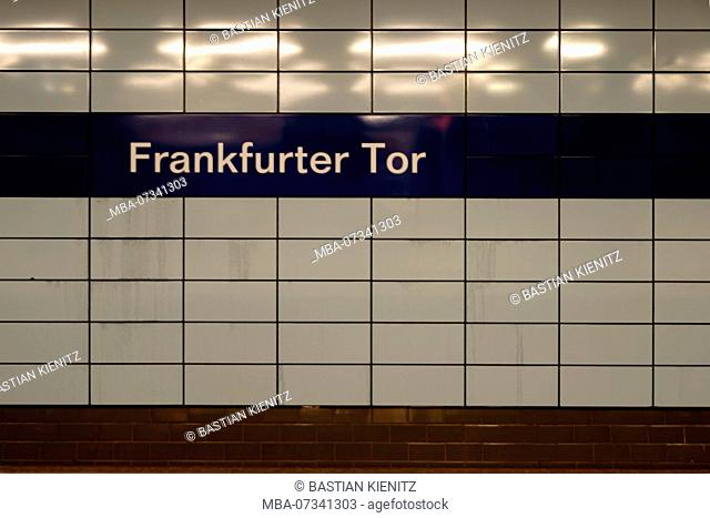 The sign of the tiled subway stop Frankfurter Tor in Berlin