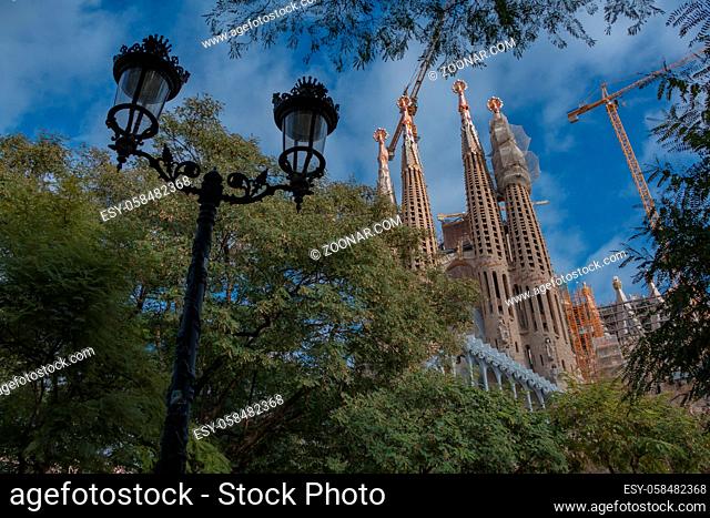 A picture of the Sagrada Família taken from a nearby park