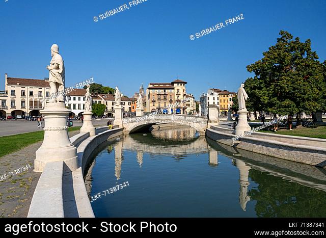 Moat around the public square with over 70 statues of historic townspeople at Prato della Valle, Padua, Italy