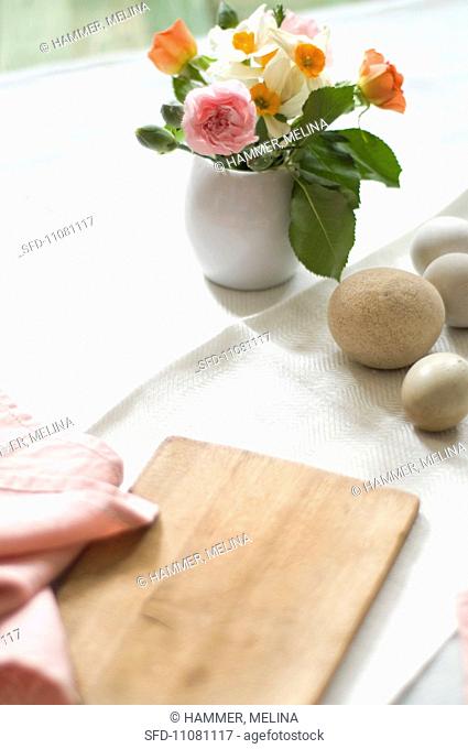 Small Flower Bouquet, Eggs and Table Cloth for Easter Table