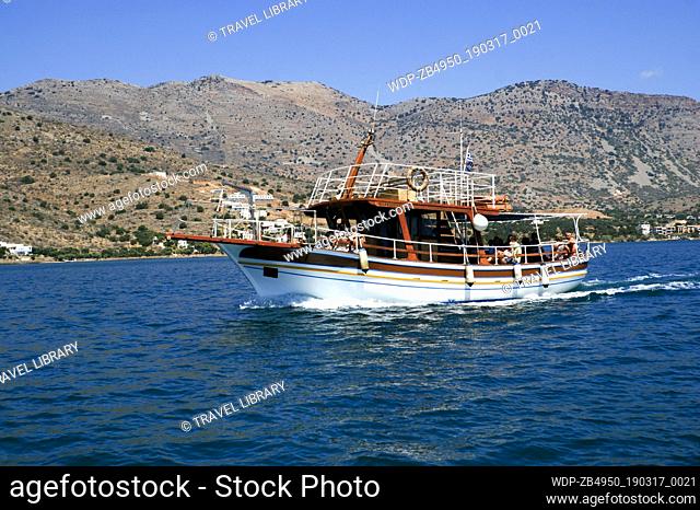 tourist boat returning from spinalonga island, elounda, crete, Greece