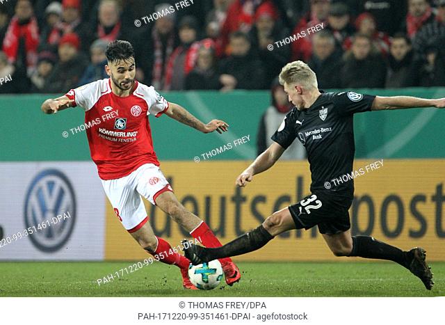 Mainz' Gerrit Holtmann(l) and Stuttgart's Andreas Beck in action during the German DFB Cup soccer match between FSV Mainz 05 and VfB Stuttgart in the Opel Arena...