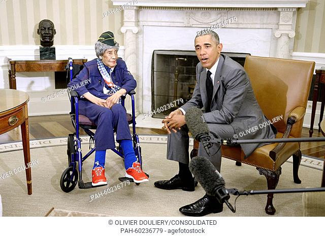 United States President Barack Obama, right, meets with 110-year-old Emma Didlake of Detroit, Michigan, the nation's oldest living veteran